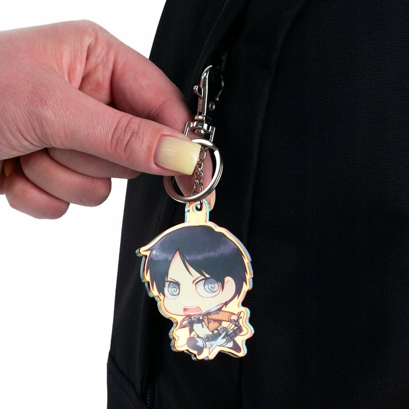 Przypięty do zamka plecaka trójwymiarowy brelok z anime.