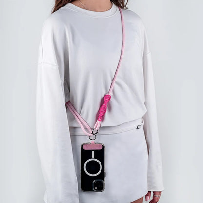 Różowy pasek do telefonu Kite crossbody noszony przez ramię na co dzień