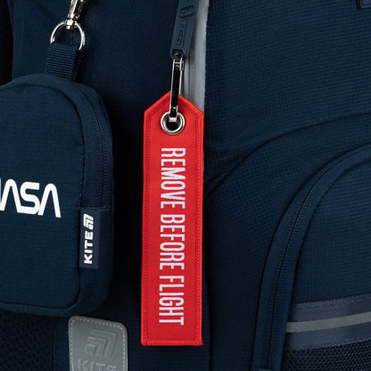 Stylowy plecak Kite NASA w kolorze niebieskim, z gumowymi ściągaczami i odblaskowymi detalami.